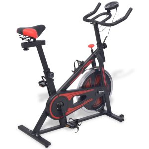 Bicicleta de entrenamiento con sensores de pulso negros y rojos.