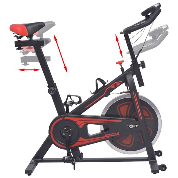 Bicicleta de entrenamiento con sensores de pulso negros y rojos. - Imagen 3