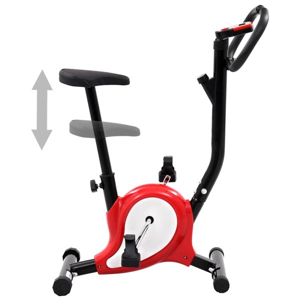 Bicicleta estática con correa de resistencia roja. - Imagen 2