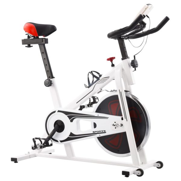 Bicicleta de entrenamiento con sensores de pulso blancos y rojos. - Imagen 2